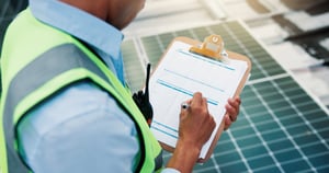 construction manager filling out a list