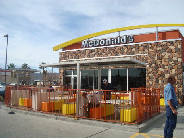 McDonalds exterior with yellow and orange seating