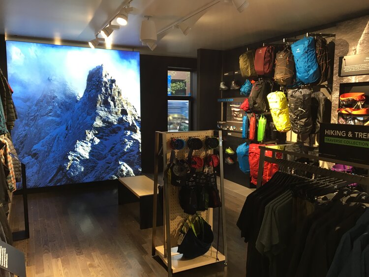 Arc’Teryx feature wall mural and merchandise displays